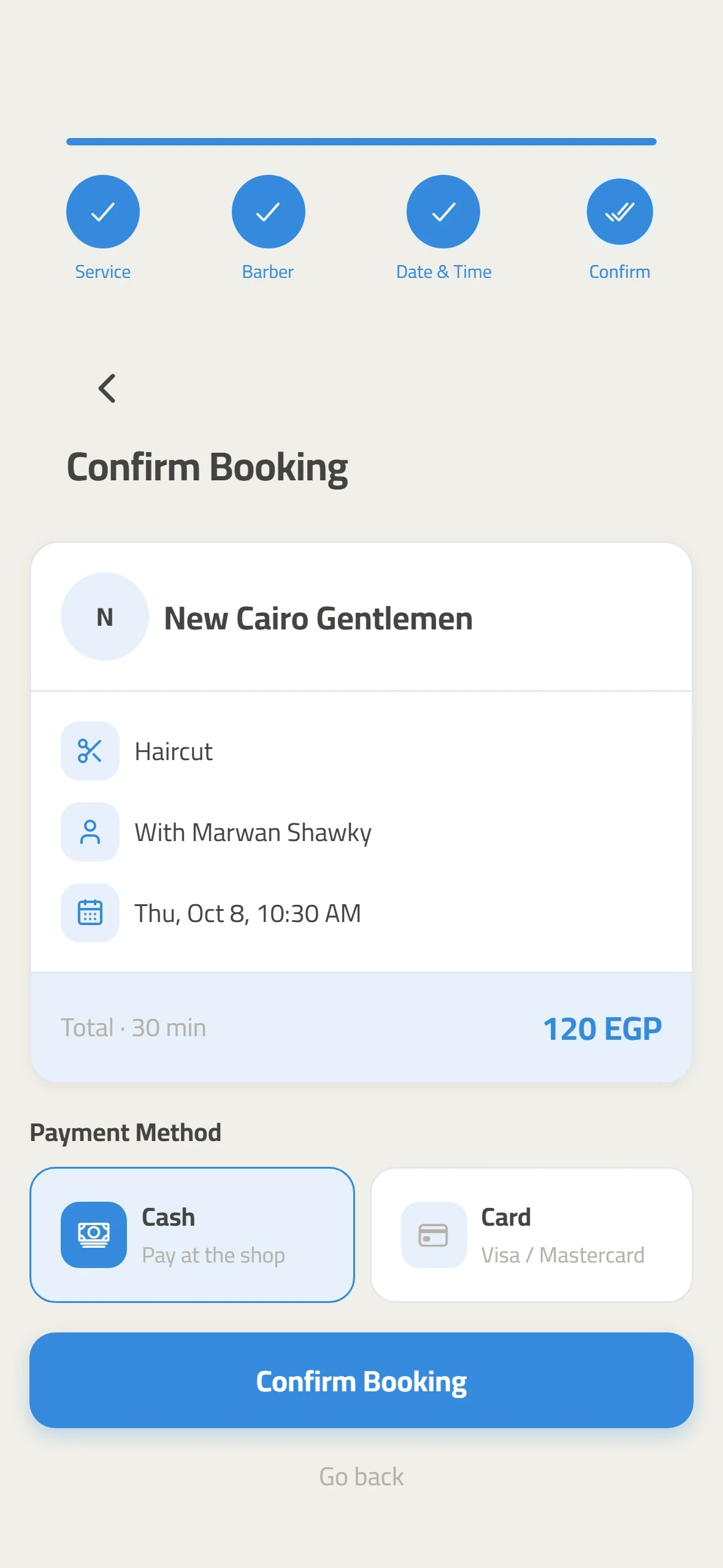 Booking summary with cash at the shop selected